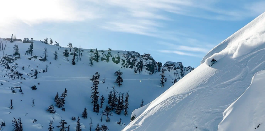 A skier carves down an Alterra Mountain Co.-owned mountain.